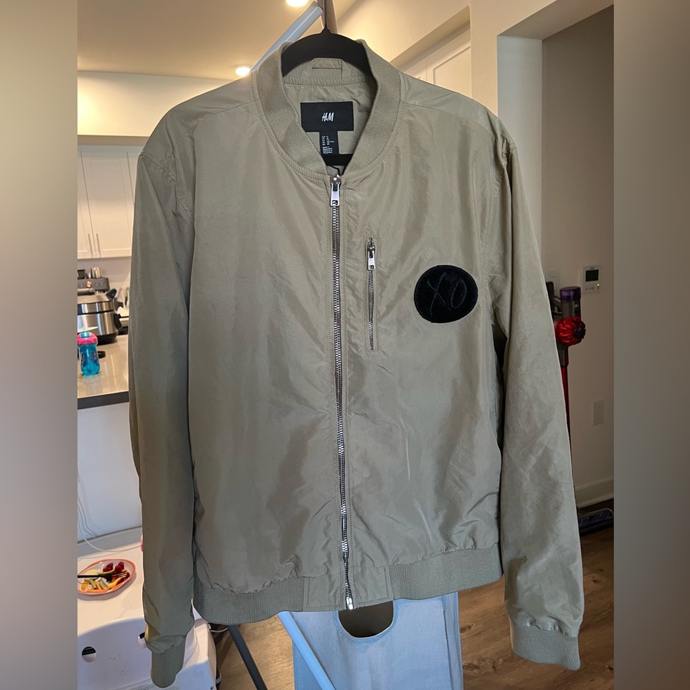The Weeknd XO Tan Bomber Jacket from H&M. Men’s Size X-Large.